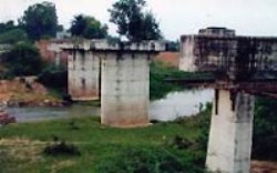  	  Signs of inertia in Banda: The Pungri bridge in Banda, incomplete since 1992 and (below) a hospital in Panchampur village 